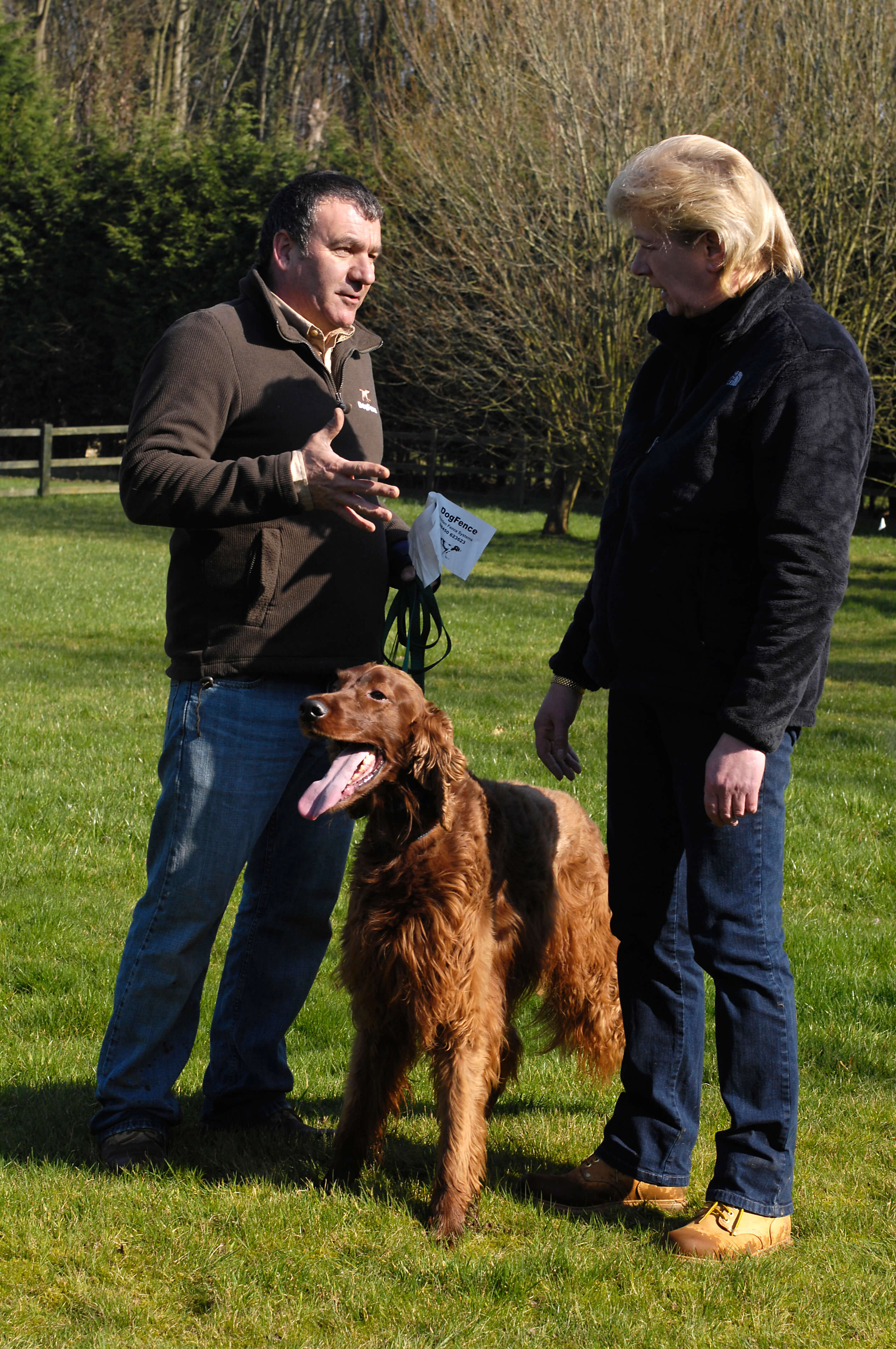 Invisible dog fence installer explaining the DogFence system to a UK customer