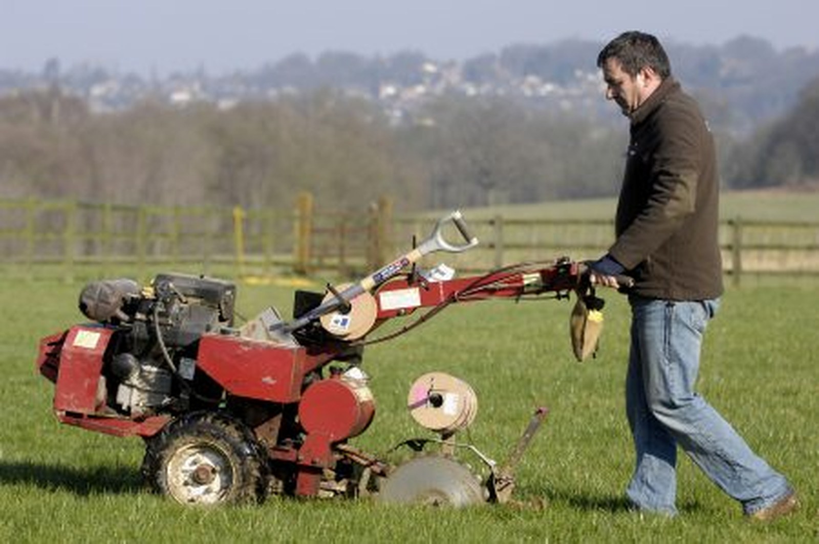 dog fence installation trenching machine cutting boundary wire channel